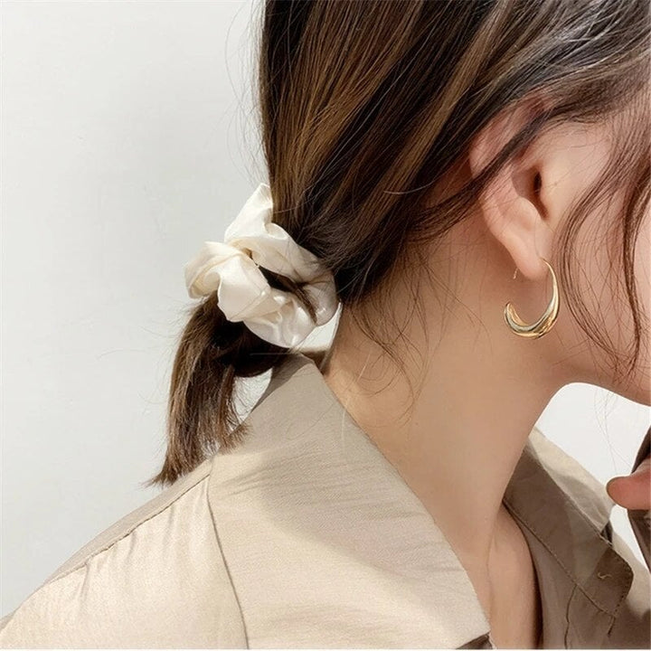 Luxeurious Earrings Made of Gold and Silver