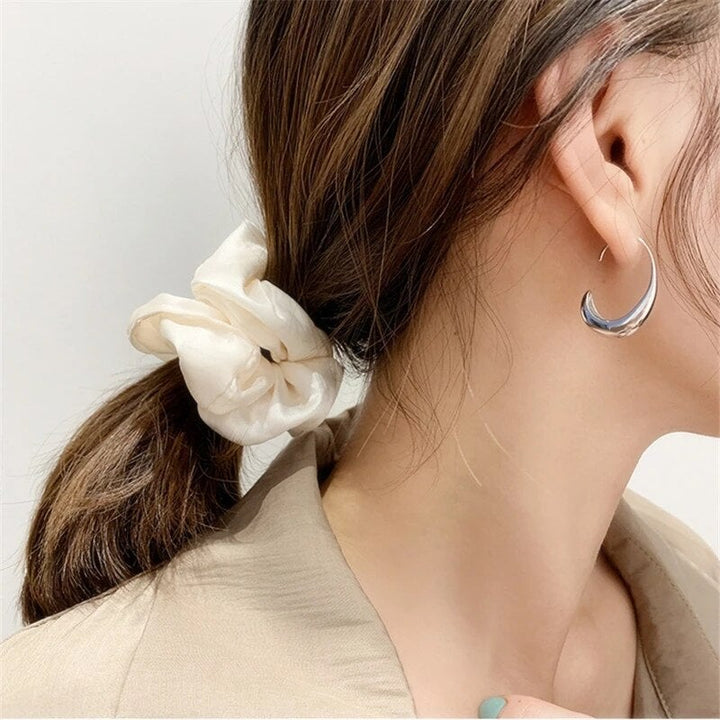 Luxeurious Earrings Made of Gold and Silver