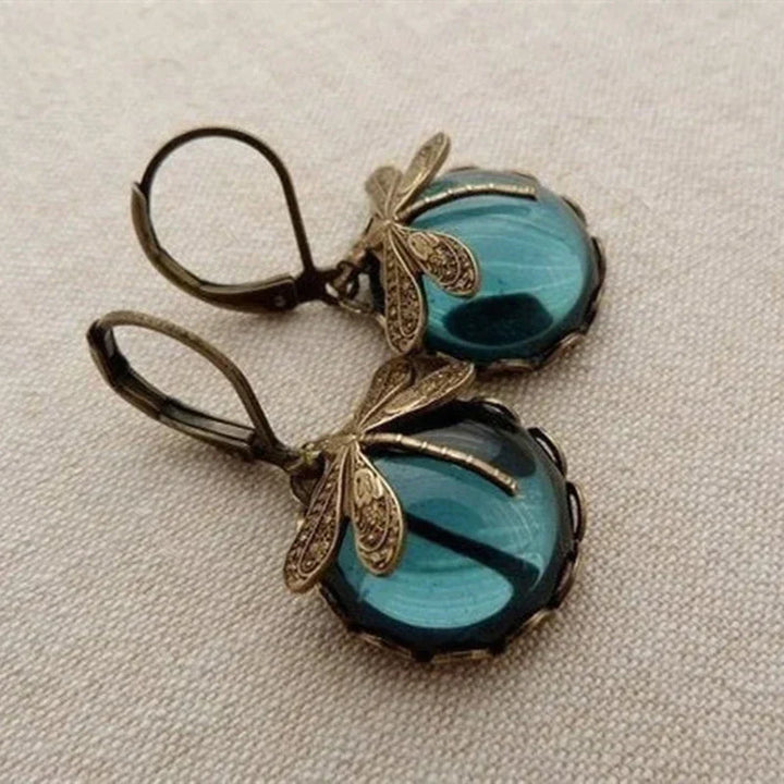Antique Gold Dragonfly Earrings with a Spherical Design