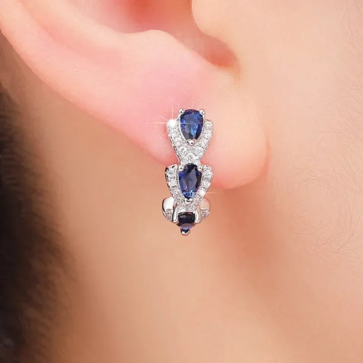 Royal Saphire Crest Earrings | White Gold