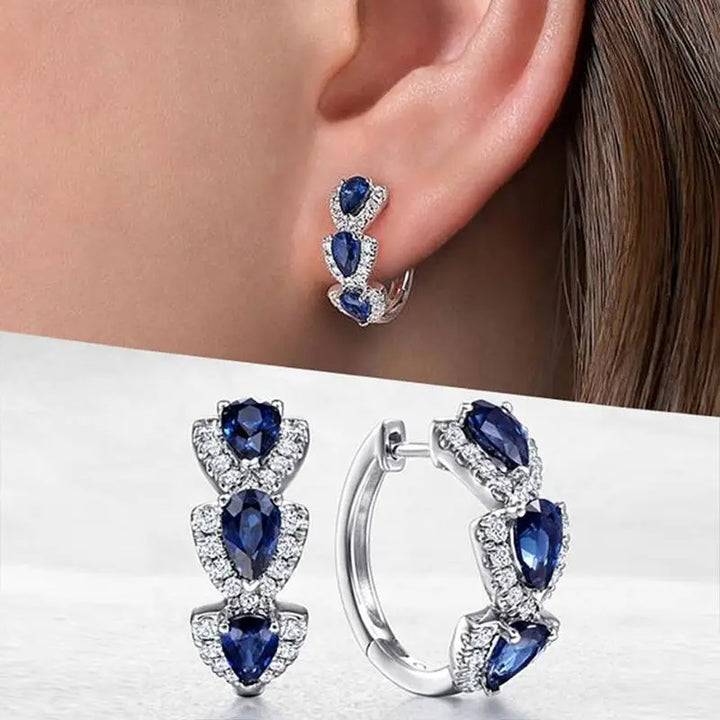 Royal Saphire Crest Earrings | White Gold