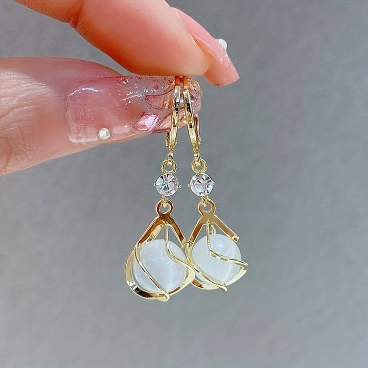 Vintaje White Opal Dangling Golden Earrings