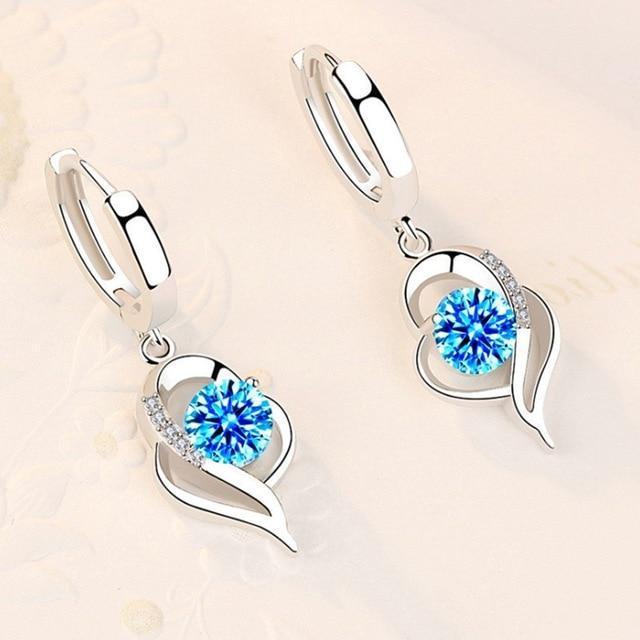Modified title: 926 Sterling Silver and Zirconia Inlaid Floral Earrings